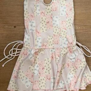 Frankie's Bikinis Kids Bib with Floral Patchwork